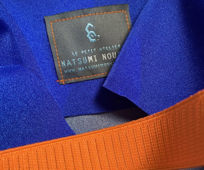 shopping dettaglio neuroprene blu arancio