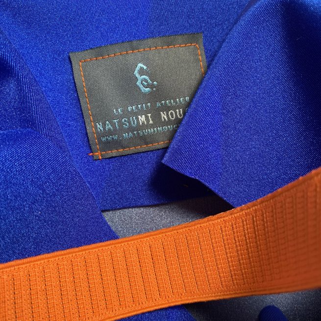shopping dettaglio neuroprene blu arancio